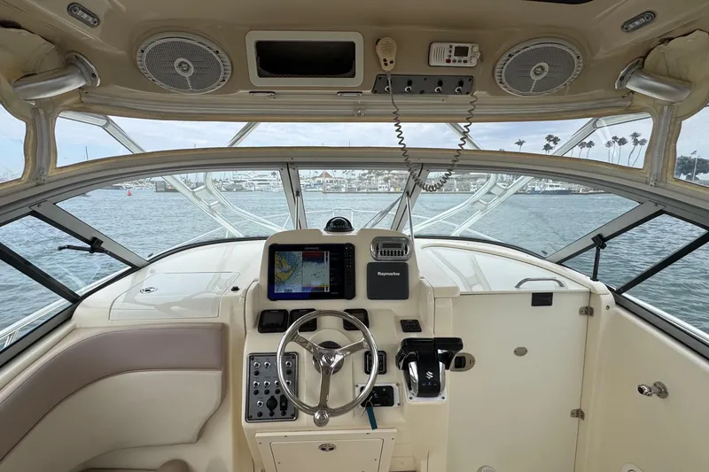 Slide: The Image of 2008 Scout 295 Abaco boat helm with navigation system and ocean view. - 9