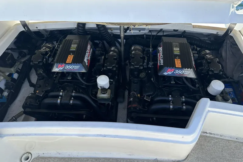 Slide: The Image of Twin Mercury 350 MAG MPI engines in a 2000 Formula 280 Sun Sport boat. - 14