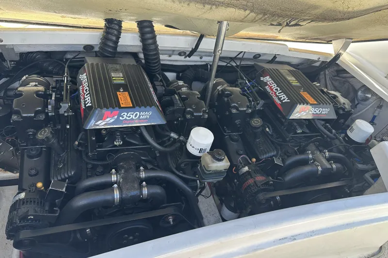 Slide: The Image of Twin Mercury 350 MAG MPI engines in a 2000 Formula 280 Sun Sport boat. - 15
