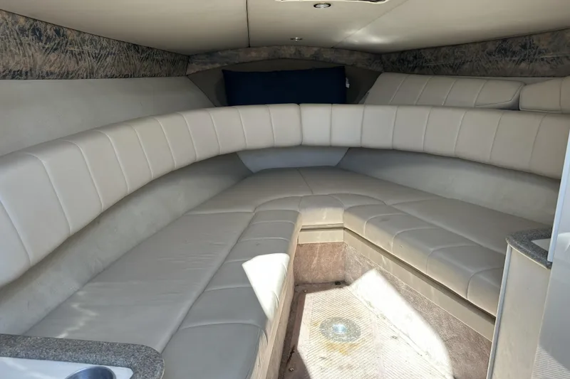 Slide: The Image of Interior of a 2000 Formula 280 Sun Sport boat with beige seating. - 12
