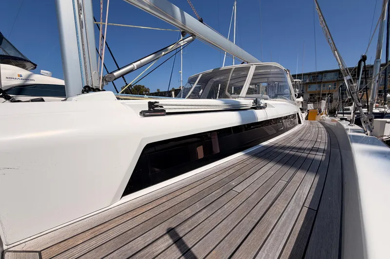 Slide: The Image of 2022 Beneteau Oceanis Yacht 54 with sleek deck design and modern features. - 8