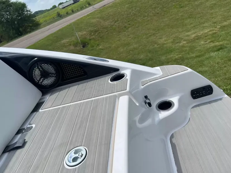 Slide: The Image of Close-up of a Yamaha SX250 boat deck with speaker and cup holders. - 25