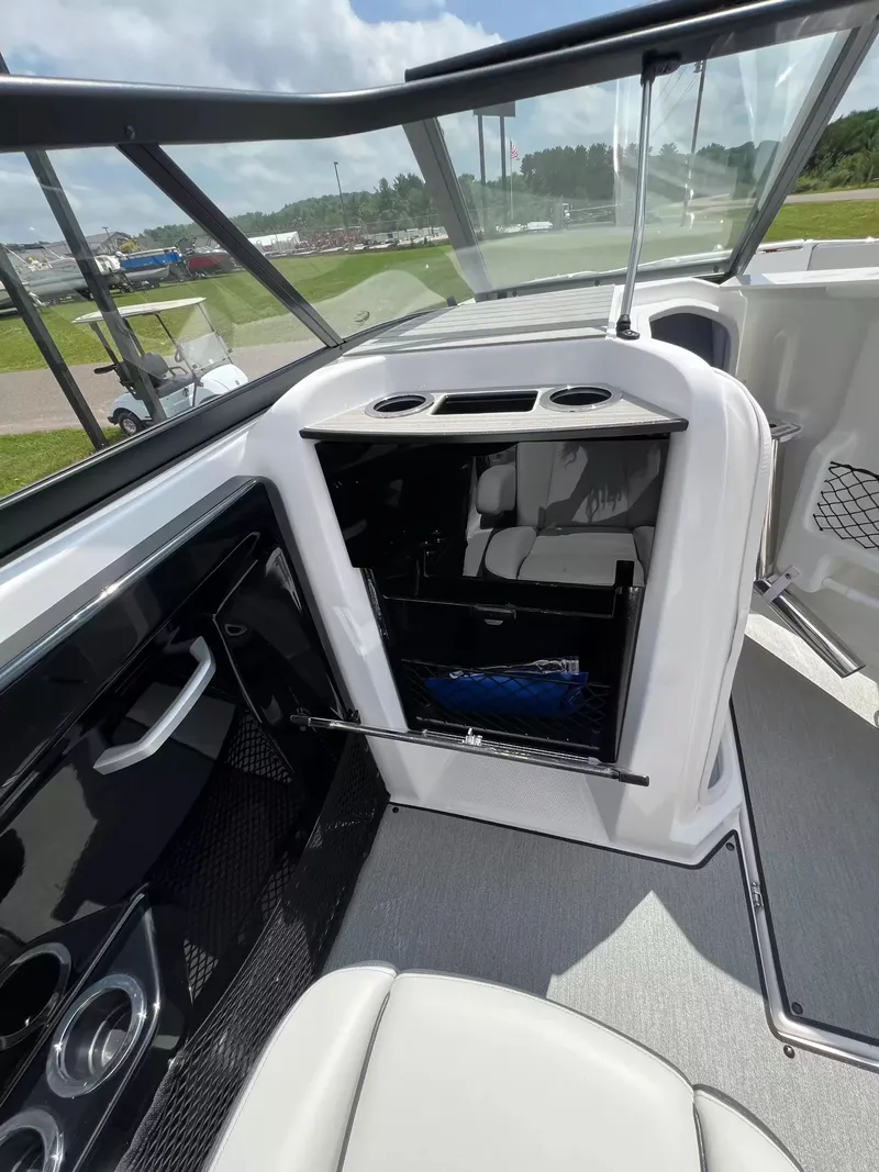 Slide: The Image of Yamaha SX250 2023: Interior view with seating area and storage compartment. - 15
