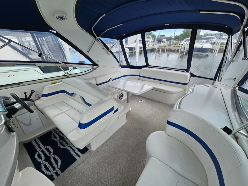 Slide: The Image of Interior of a 2001 Formula 400 Super Sport with blue and white seating. - 10