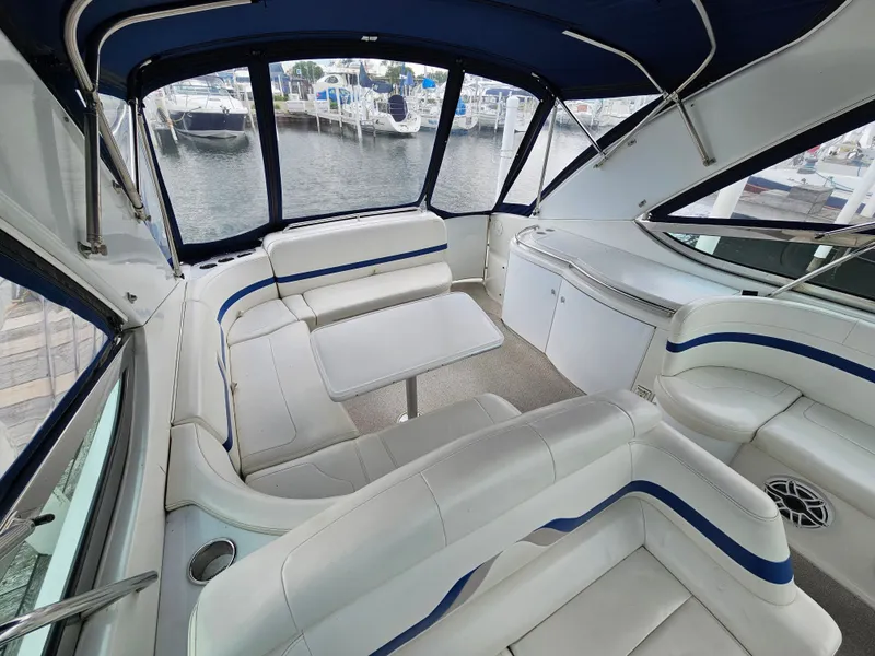 Slide: The Image of Interior of a 2001 Formula 400 Super Sport with white seating and blue accents. - 9