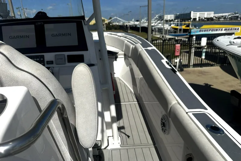 Slide: The Image of Interior view of a 2002 Sea Fox 228 Commander boat with Garmin displays. - 17