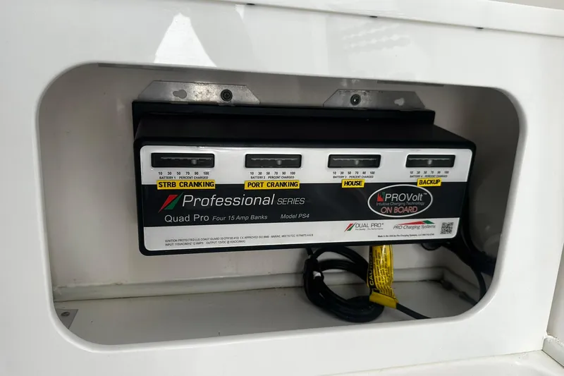 Slide: The Image of Onboard battery charger in a 2002 Sea Fox 228 Commander boat compartment. - 35