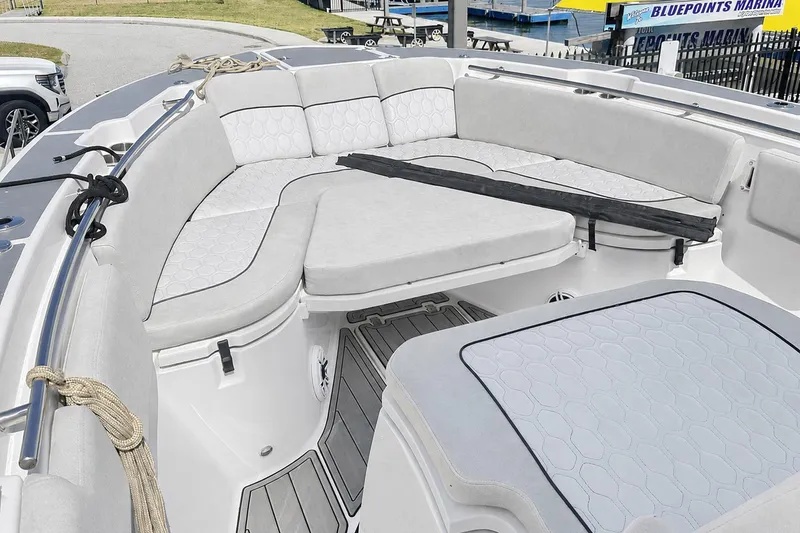 Slide: The Image of Interior view of a 2002 Sea Fox 228 Commander boat with cushioned seating. - 37