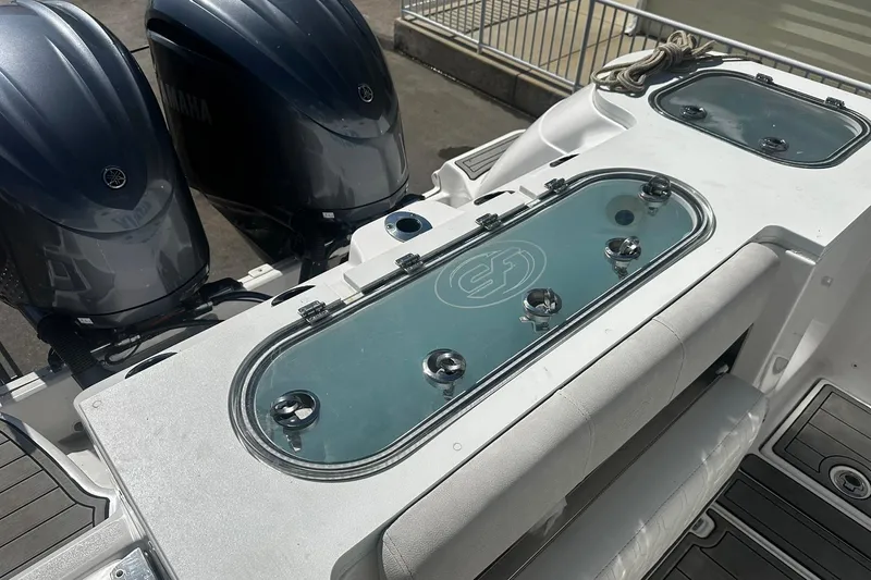 Slide: The Image of Sea Fox 228 Commander 2002 boat with dual Yamaha engines and livewell. - 4