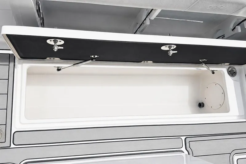 Slide: The Image of Open storage compartment on a 2002 Sea Fox 228 Commander boat. - 46
