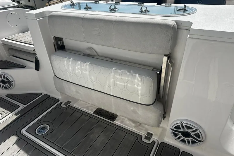 Slide: The Image of Foldable seat on a 2002 Sea Fox 228 Commander boat deck. - 9