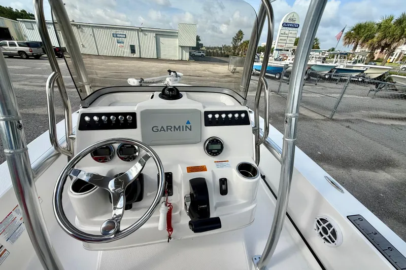 Slide: The Image of 2023 Robalo 206 Cayman boat console with Garmin navigation system. - 6