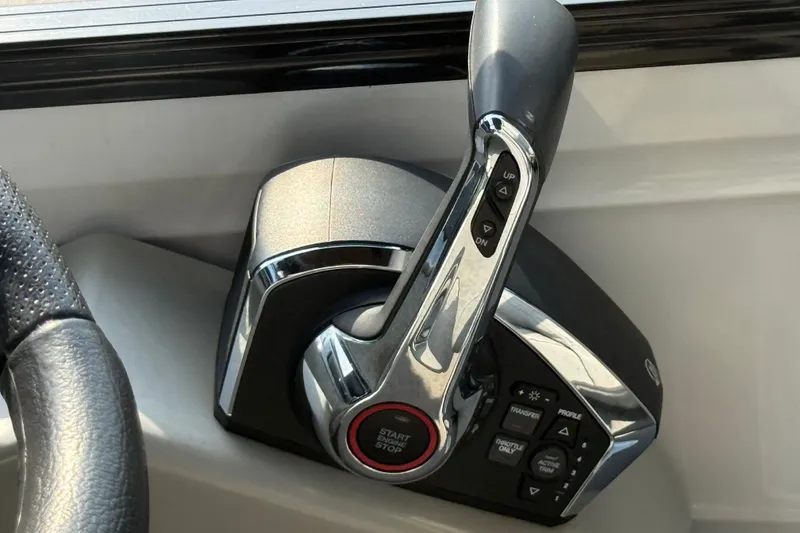 Slide: The Image of Throttle control panel of 2024 Regency 250 DL3 boat, featuring start/stop button and controls. - 20