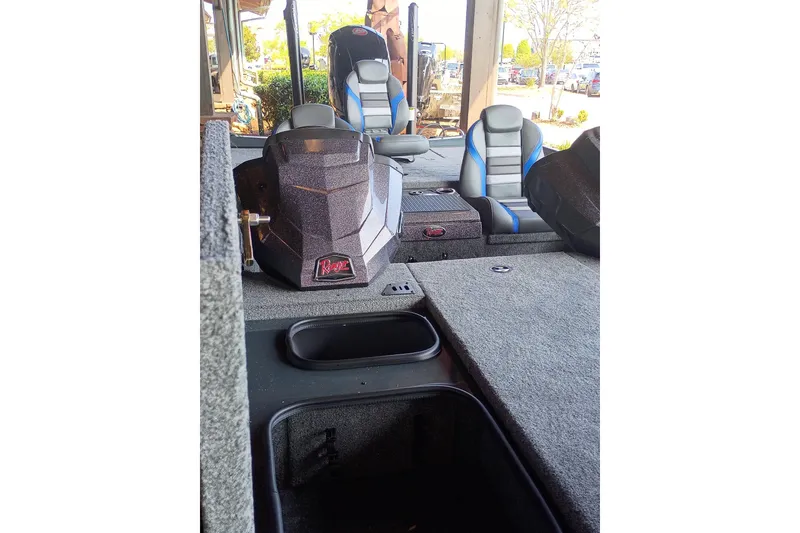 Slide: The Image of 2026 Ranger RT198P boat interior with seating and storage compartments. - 5