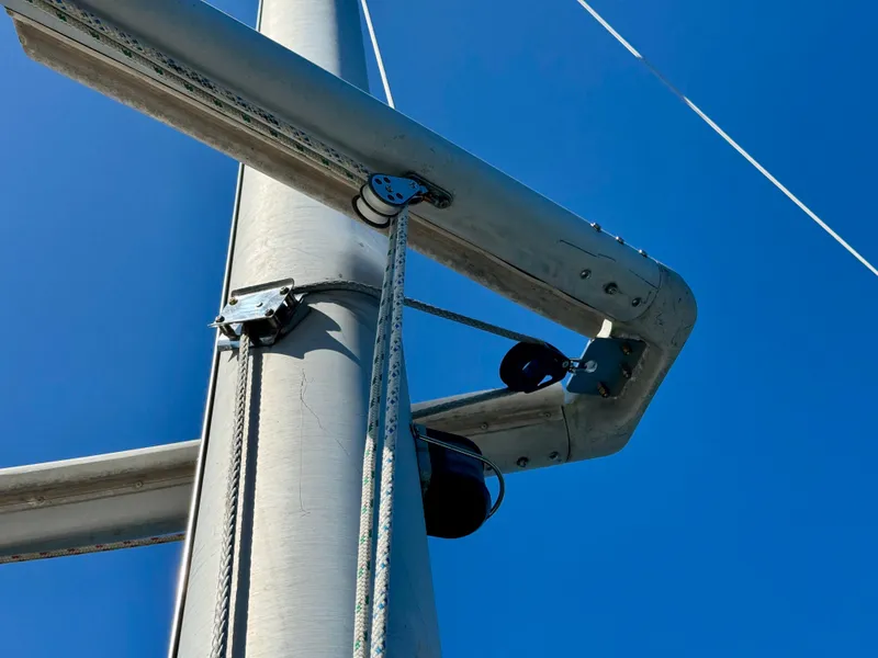 Slide: The Image of Mast and rigging of 1989 Nonsuch 30 Ultra sailboat against clear blue sky. - 20