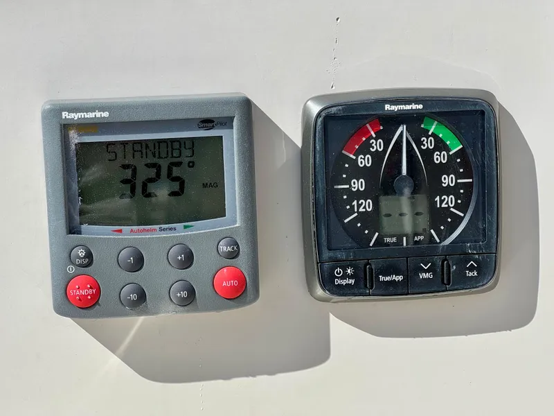 Slide: The Image of Raymarine navigation instruments on a 1989 Nonsuch 30 Ultra sailboat, displaying heading and wind angle. - 31