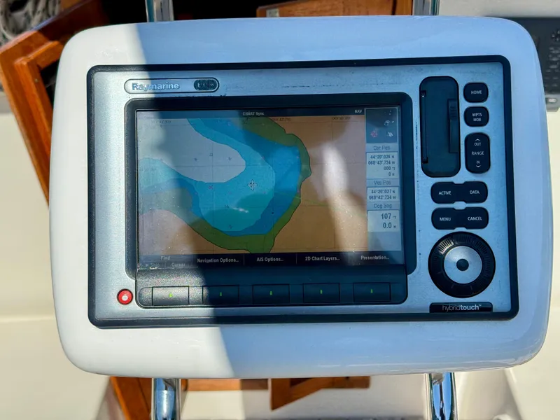 Slide: The Image of Raymarine navigation system on 1989 Nonsuch 30 Ultra sailboat, displaying nautical chart. - 32