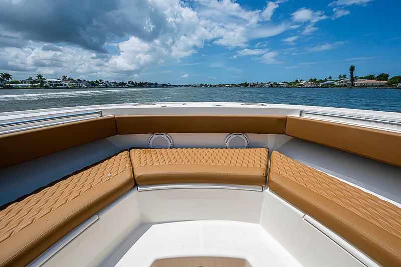 Slide: The Image of Luxurious seating on 2021 Gulf Crosser 52 boat with scenic water view. - 10