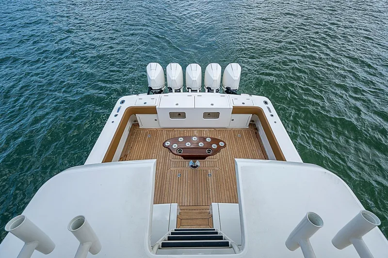 Slide: The Image of Aerial view of 2021 Gulf Crosser 52 yacht deck with five outboard engines. - 75