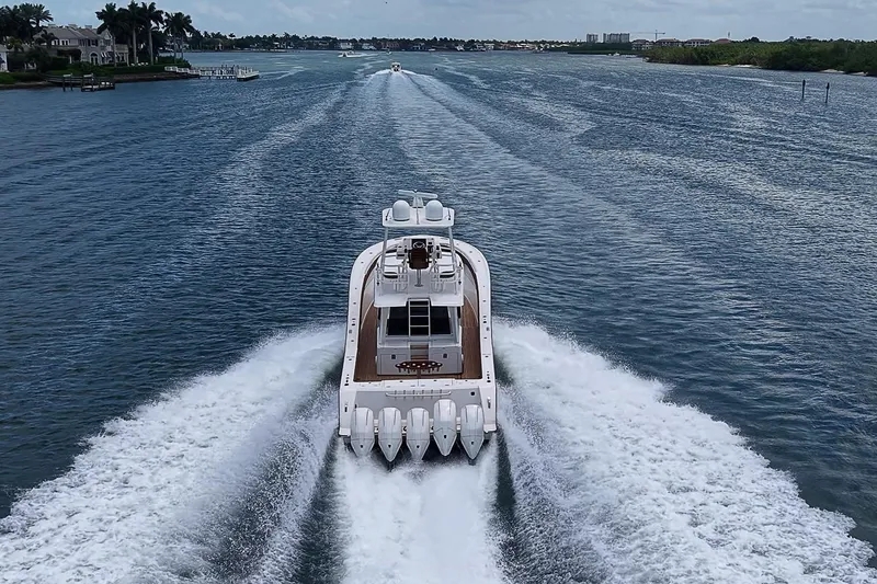 Slide: The Image of Aerial view of 2021 Gulf Crosser 52 yacht cruising on a scenic waterway. - 91