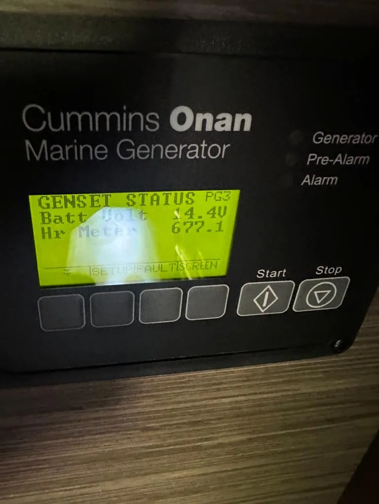 Slide: The Image of Cummins Onan marine generator display on 2019 Tiara Yachts C53. - 26