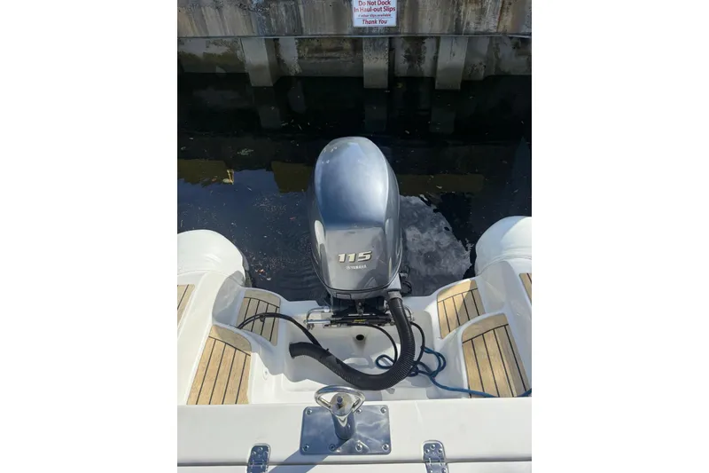 Slide: The Image of 2014 AB Inflatables Nautilus 17 DLX with Yamaha 115 outboard motor at dock. - 21