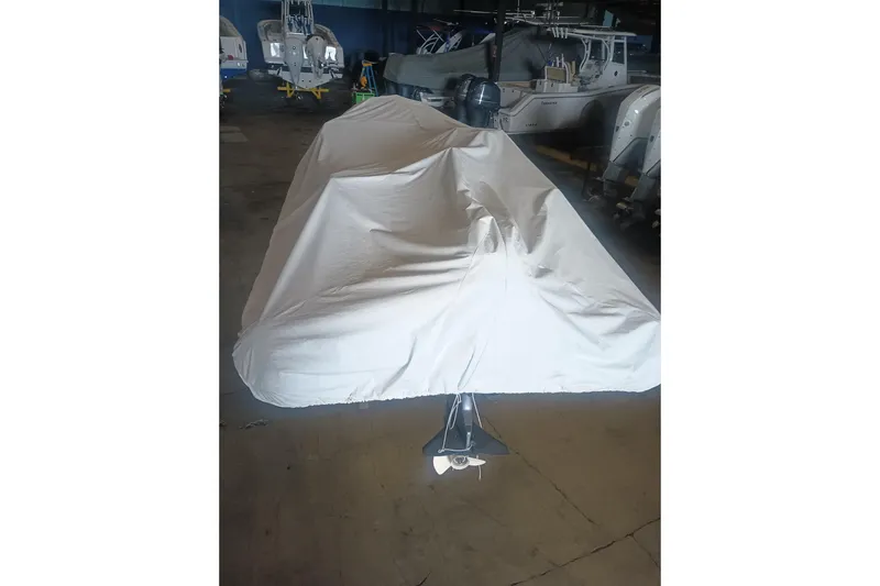 Slide: The Image of Covered 2014 AB Inflatables Nautilus 17 DLX boat stored indoors. - 24