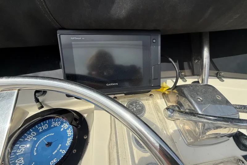 Slide: The Image of Garmin GPS and compass on 1981 Hatteras 43 Motor Yacht dashboard. - 36