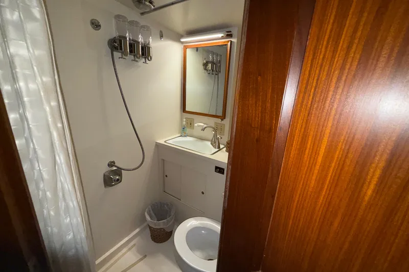Slide: The Image of Bathroom interior of 1981 Hatteras 43 Motor Yacht with shower and sink. - 55