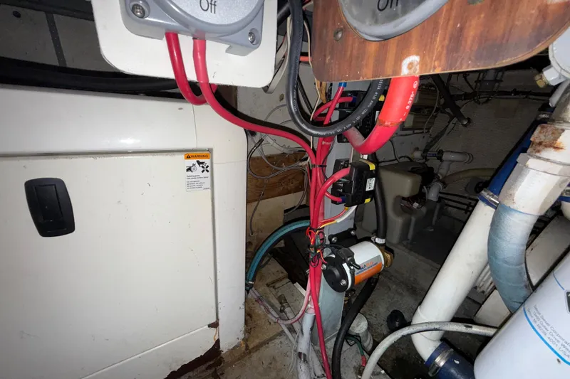Slide: The Image of Engine room of 1981 Hatteras 43 Motor Yacht with wiring and equipment. - 69