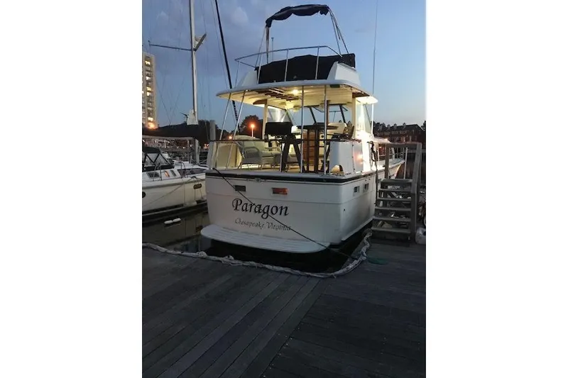 Slide: The Image of 1981 Hatteras 43 Motor Yacht docked at sunset, Chesapeake, Virginia. - 5