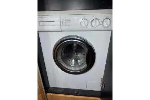 Slide: The Image of Front-loading washing machine on a 1998 Sea Ray Sundancer 540 yacht. - 14
