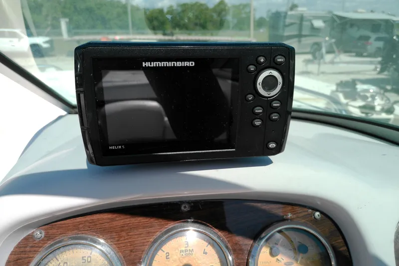 Slide: The Image of Humminbird Helix 5 fish finder on 2006 Chaparral 236 SSi dashboard. - 10