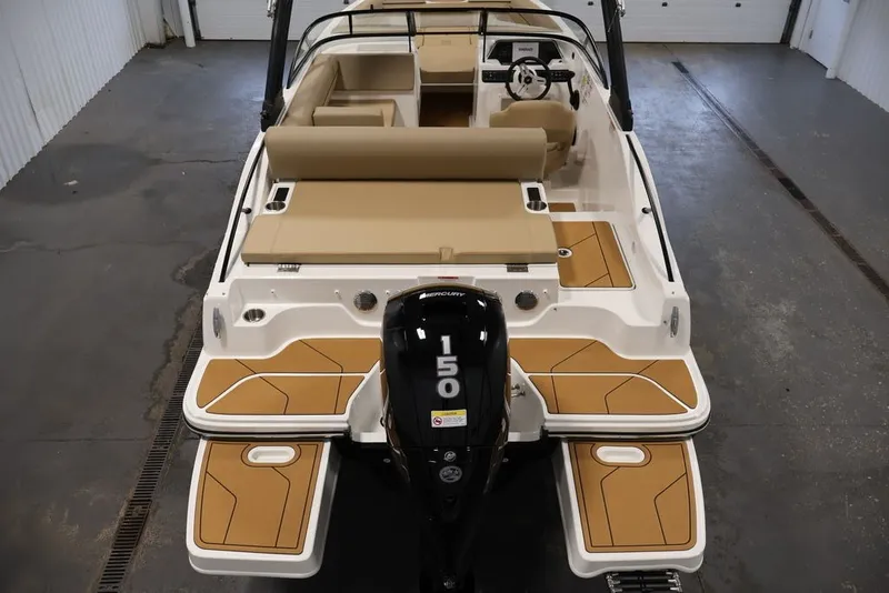 Slide: The Image of 2026 Bayliner D20 boat with tan seating and a 150 horsepower Mercury engine. - 18