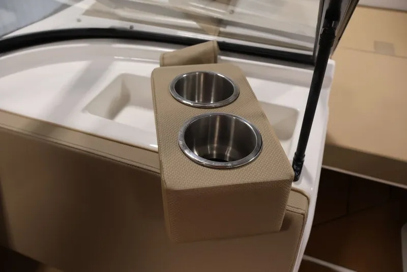 Slide: The Image of Cup holders on 2026 Bayliner D20 boat interior. - 25