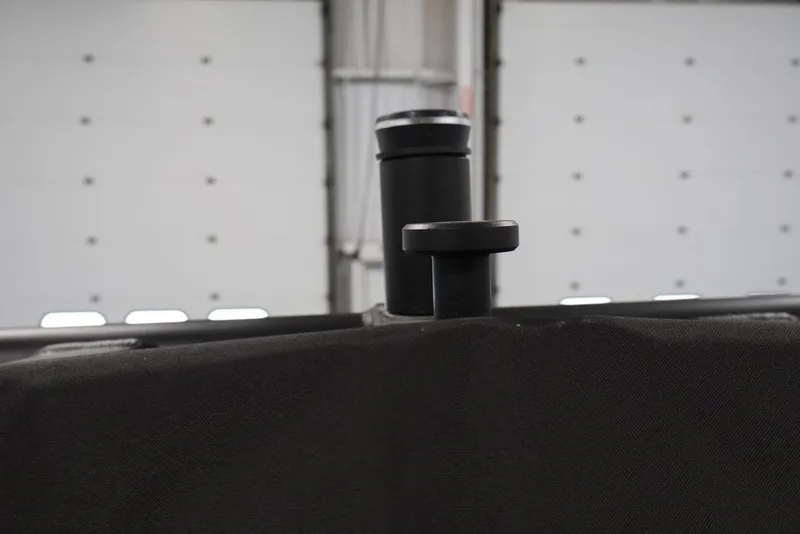 Slide: The Image of Close-up of a 2026 Bayliner D20 boat component in a garage setting. - 41