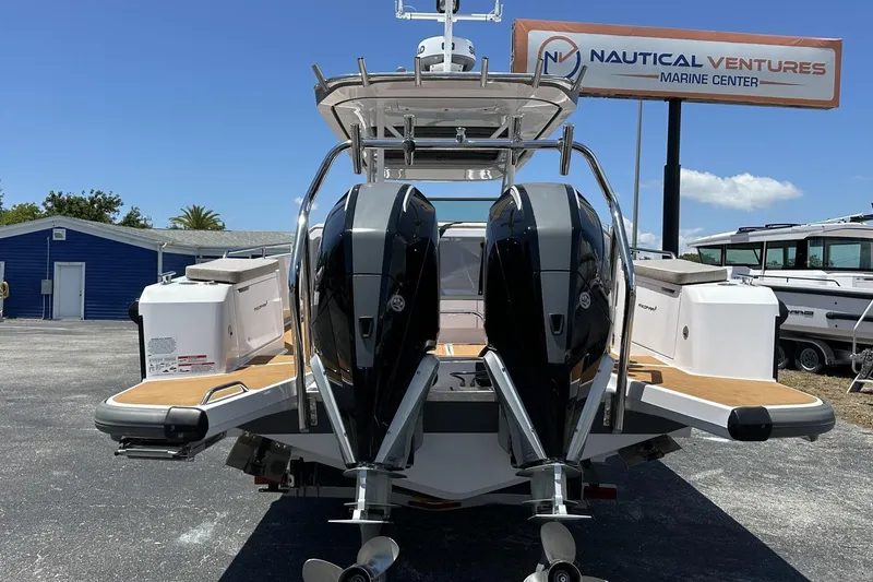 Slide: The Image of 2024 Axopar 37 Sun-Top boat with dual engines at Nautical Ventures Marine Center. - 10