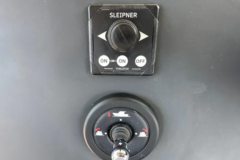 Slide: The Image of Control panel of 2024 Axopar 37 Sun-Top featuring Sleipner thruster switches. - 26