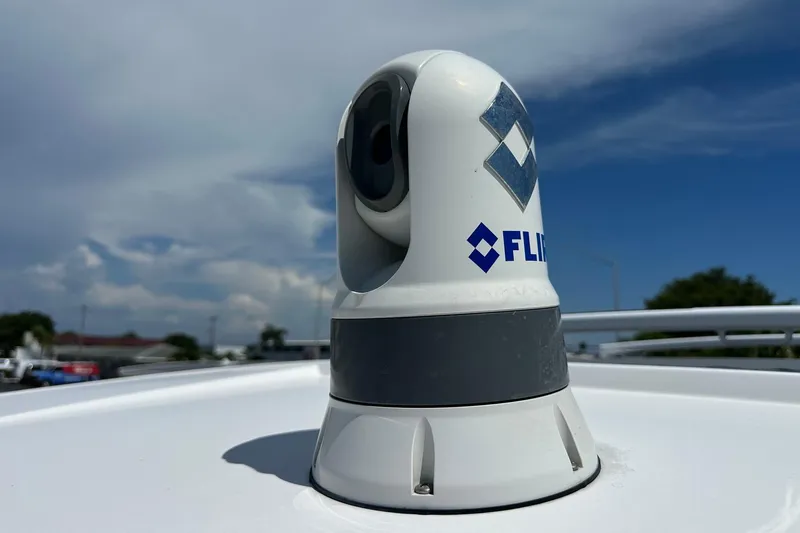 Slide: The Image of FLIR camera on 2024 Axopar 37 Sun-Top boat under clear sky. - 55