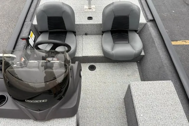 Slide: The Image of 2023 Tracker Pro 170 boat interior with dual seats and steering console. - 21