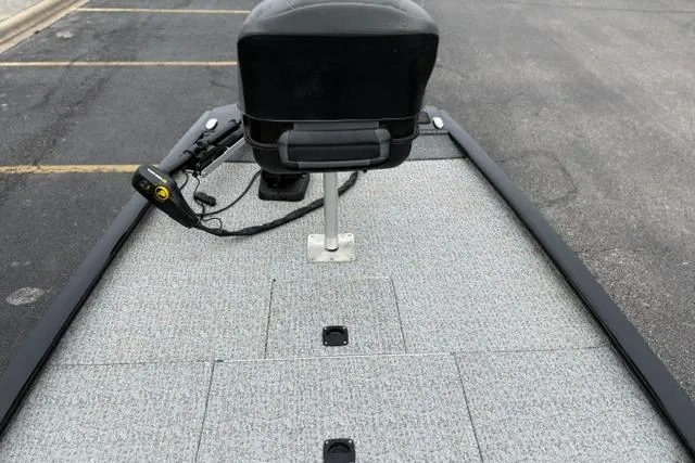 Slide: The Image of 2023 Tracker Pro 170 boat deck with seat and trolling motor. - 24