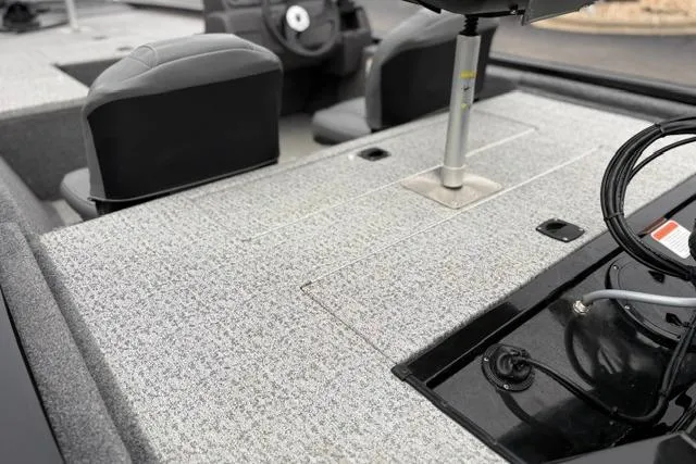 Slide: The Image of 2023 Tracker Pro 170 boat interior with seating and fishing equipment setup. - 36