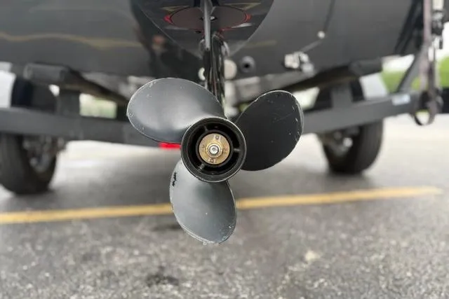 Slide: The Image of Propeller of 2023 Tracker Pro 170 boat on trailer, close-up view. - 39