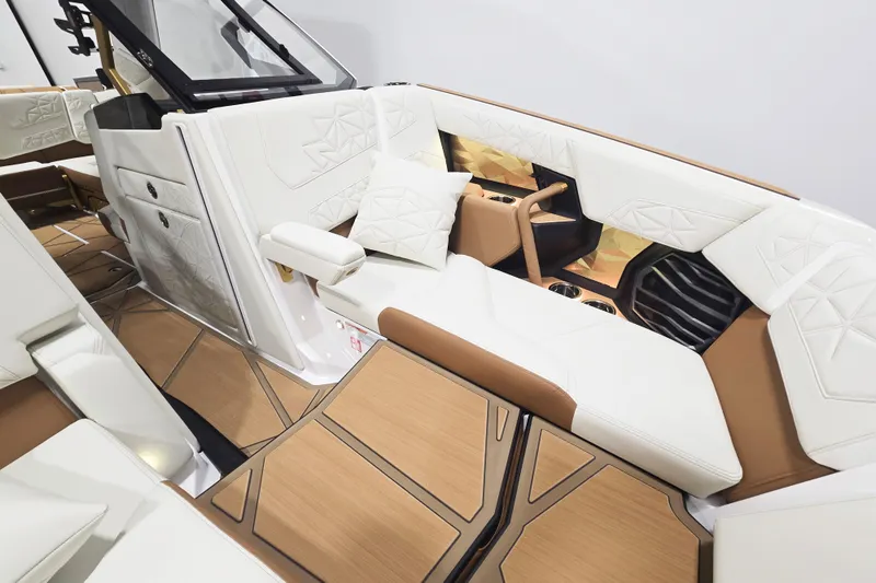 Slide: The Image of Luxurious interior of 2026 Nautique Super Air Nautique G23 Paragon with elegant seating. - 12