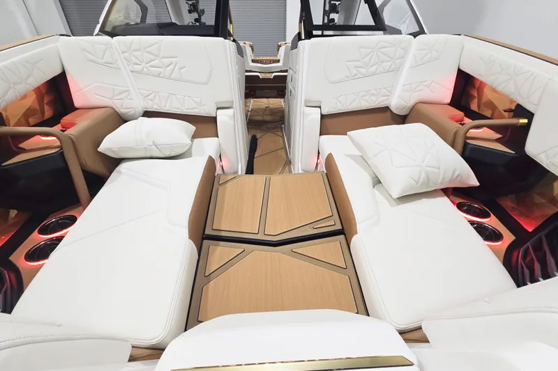 Slide: The Image of Luxurious interior of 2026 Nautique Super Air Nautique G23 Paragon with plush seating. - 11