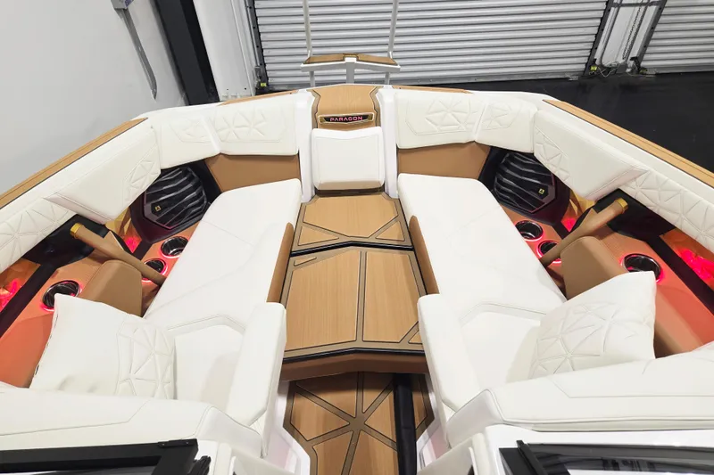 Slide: The Image of Luxurious interior of 2026 Nautique Super Air Nautique G23 Paragon boat with elegant seating. - 13