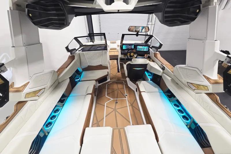 Slide: The Image of Luxurious interior of 2026 Nautique Super Air Nautique G23 Paragon with ambient lighting. - 20