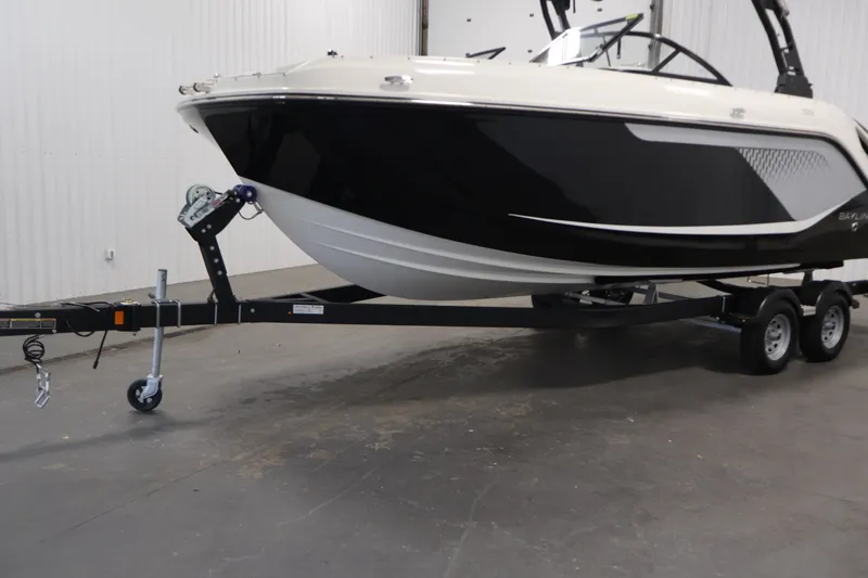 Slide: The Image of 2026 Bayliner D22I boat on trailer in indoor storage facility. - 45