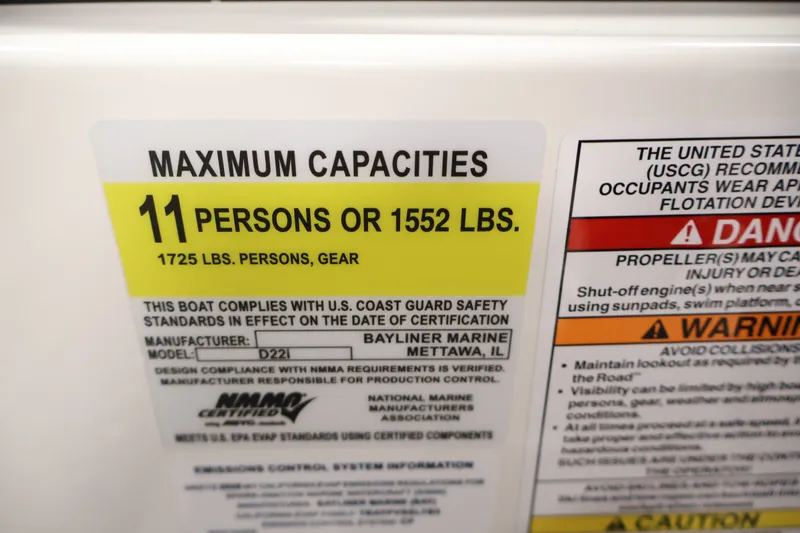 Slide: The Image of Bayliner D22I 2026 boat capacity label: 11 persons or 1552 lbs, 1725 lbs with gear. - 23