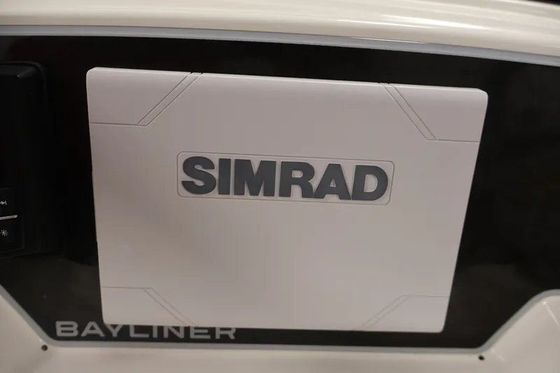 Slide: The Image of 2026 Bayliner D22I dashboard featuring Simrad navigation system. - 19